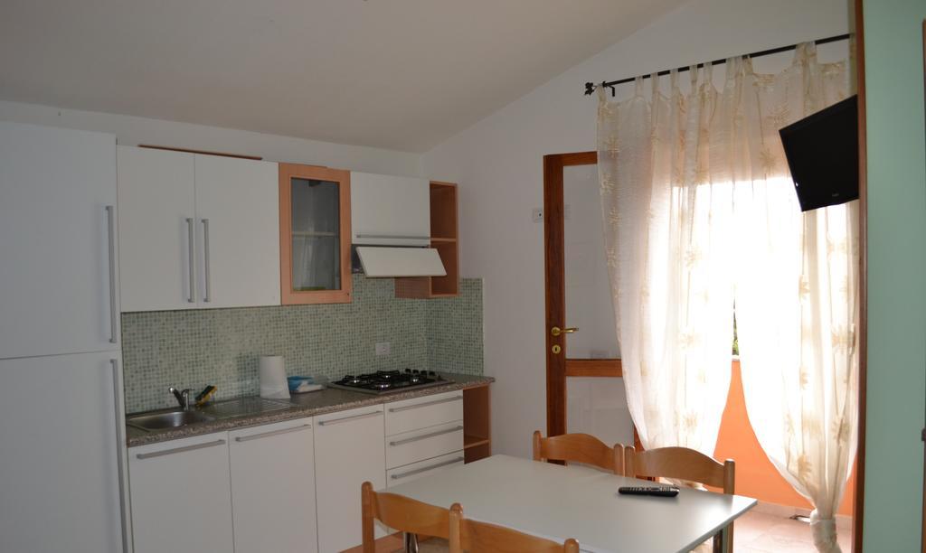 Apartments Mimose Badesi Rom bilde